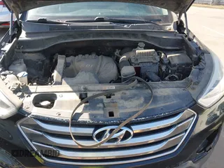 2016 Hyundai Santa Fe z VIN 5XYZT3LB6GG379054, wystawiony jako IAAI lot #42406174 z przebiegiem 182 073 mil mil oraz . Historia ofert i sprzedaży dostępna na DreamBid. Obrazek 10.