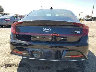 2022 Hyundai Sonata Hybrid Blue with VIN KMHL24JJ9NA041424, listed as a Copart auction lot 70693204 with 32,689 mi miles and Salvage Title. Bid and sale history available at carsss.com. Image 6.