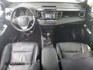 2017 Toyota RAV4 SE z VIN JTMJJREV2HD077614, wystawiony jako Copart lot #87924205 z przebiegiem 92 896 mil mil oraz Szkoda całkowita • Salvage title. Historia ofert i sprzedaży dostępna na DreamBid. Obrazek 8.