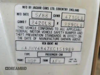 1989 Jaguar XJS z VIN SAJNV4847KC151989, wystawiony jako Copart lot #61401054 z przebiegiem 80 570 mil mil oraz Szkody całkowita. Historia ofert i sprzedaży dostępna na DreamBid. Obrazek 12.