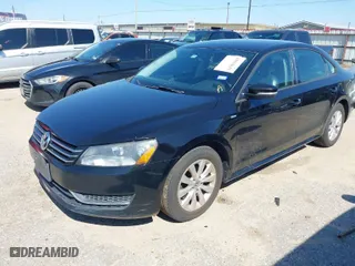 2015 Volkswagen Passat 1.8T S with VIN 1VWAT7A37FC002037, listed as a IAAI auction lot 41616615 with 174,493 mi miles. Bid and sale history available at carsss.com. Image 2.