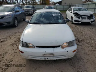 1996 Geo Prizm z VIN 1Y1SK5261TZ028032, wystawiony jako Copart lot #77434654 z przebiegiem 54 665 mil mil oraz Tytuł czysty. Historia ofert i sprzedaży dostępna na DreamBid. Obrazek 5.