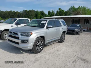 2014 Toyota 4Runner Limited with VIN JTEBU5JR9E5182133, listed as a IAAI auction lot 42081836 with 129,000 mi miles. Bid and sale history available at carsss.com. Image 2.