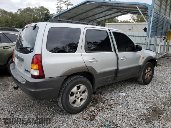 2003 Mazda Tribute LX with VIN 4F2YZ04153KM20941, listed as a Copart auction lot 82683264 with 195,240 mi miles and Salvage Title. Bid and sale history available at DreamBid. Image 3.
