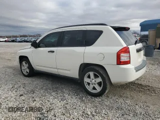 2009 Jeep Compass North with VIN 1J4FT47B49D196637, listed as a Copart auction lot 82918314 with 156,117 mi miles and Clean Title. Bid and sale history available at carsss.com. Image 2.