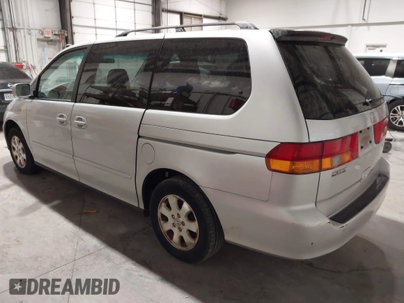 2003 Honda Odyssey EX with VIN 5FNRL18673B009670, listed as a IAAI auction lot 42130172 with 218,391 mi miles and . Bid and sale history available at DreamBid. Image 3.