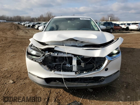 2021 Mazda CX-30 Preferred with VIN 3MVDMACL0MM216112, listed as a Copart auction lot 83617634 with 71,371 mi miles and Salvage Title. Bid and sale history available at DreamBid. Image 5.