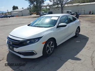 2020 Honda Civic Sedan LX with VIN 19XFC2F64LE201551, listed as a IAAI auction lot 41939055 with 67,461 mi miles. Bid and sale history available at carsss.com. Image 18.