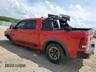 2016 Ram 1500 Rebel z VIN 1C6RR7YT8GS251598, wystawiony jako Copart lot #55291555 z przebiegiem 128 756 mil mil oraz Szkoda całkowita • Salvage title. Historia ofert i sprzedaży dostępna na DreamBid. Obrazek 2.