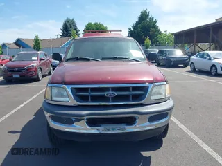 1998 Ford F-150 with VIN 1FTZF182XWKA36602, listed as a IAAI auction lot 42472442 with 112,235 mi miles and . Bid and sale history available at DreamBid. Image 12.