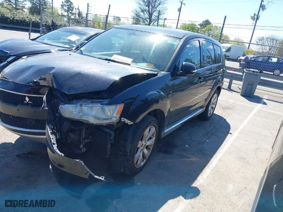 2011 Mitsubishi Outlander GT with VIN JA4JT5AX7BU020644, listed as a IAAI auction lot 41824859 with 125,230 mi miles. Bid and sale history available at carsss.com. Image 2.