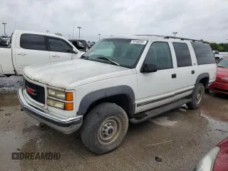 1997 GMC Suburban z VIN 1GKGK26JXVJ715765, wystawiony jako Copart lot #73188284 z przebiegiem 301 101 mil mil oraz Szkody całkowita. Historia ofert i sprzedaży dostępna na DreamBid. Obrazek 1.