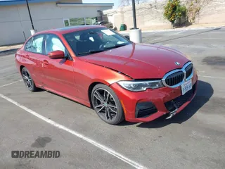 2021 BMW 3 Series 330i with VIN 3MW5R1J02M8B52337, listed as a IAAI auction lot 41610136 with 1 mi miles. Bid and sale history available at carsss.com. Image 1.