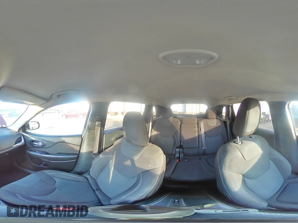 2016 Jeep Cherokee Latitude with VIN 1C4PJLCBXGW221848, listed as a Copart auction lot 51090945 with 216,945 mi miles and Salvage title. Bid and sale history available at DreamBid. Image 13.