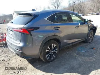 2021 Lexus NX with VIN JTJSARDZ8M2253108, listed as a IAAI auction lot 41790614 with 106,216 mi miles. Bid and sale history available at carsss.com. Image 4.