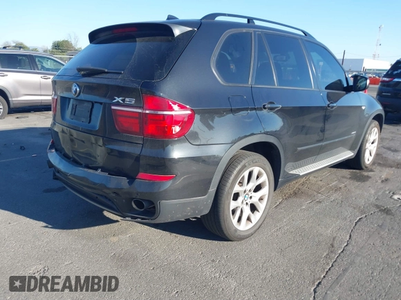 2012 BMW X5 35i z VIN 5UXZV4C50CL744724, wystawiony jako IAAI lot #41635239 z przebiegiem 166 363 mil mil oraz . Historia ofert i sprzedaży dostępna na DreamBid. Obrazek 4.