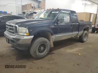 2002 Ford Super Duty F-250 XL with VIN 1FTNX21L42EB76111, listed as a Copart auction lot 77080094 with 228,710 mi miles and Salvage Title. Bid and sale history available at carsss.com. Image 1.