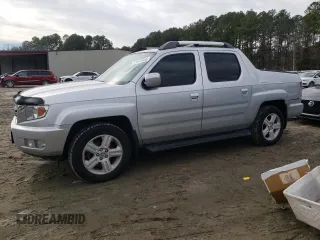 2013 Honda Ridgeline RTL with VIN 5FPYK1F53DB017279, listed as a Copart auction lot 41841455 with 121,121 mi miles and Salvage Title. Bid and sale history available at carsss.com. Image 1.