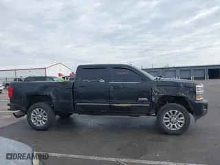 2015 Chevrolet Silverado 2500HD Built After Aug 14 High Country with VIN 1GC1KXE84FF536963, listed as a IAAI auction lot 41439878 with 191,471 mi miles. Bid and sale history available at carsss.com. Image 13.