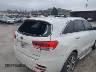 2016 Kia Sorento SX z VIN 5XYPKDA59GG113511, wystawiony jako IAAI lot #41997346 z przebiegiem 140 017 mil mil oraz . Historia ofert i sprzedaży dostępna na DreamBid. Obrazek 18.