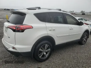 2018 Toyota RAV4 XLE with VIN JTMWFREV3JJ746262, listed as a Copart auction lot 51811035 with 84,319 mi miles and Salvage Title. Bid and sale history available at DreamBid. Image 3.