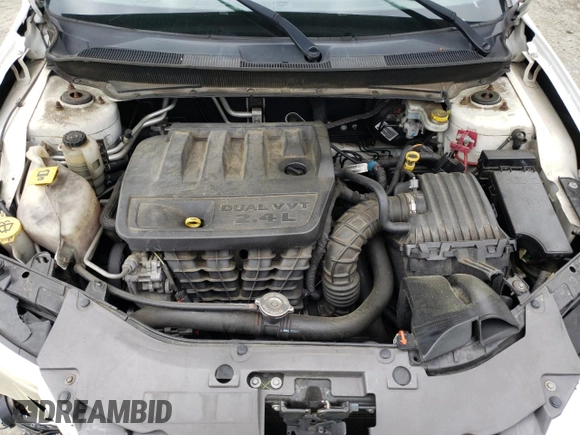 2010 Chrysler Sebring Touring z VIN 1C3CC4FB5AN192786, wystawiony jako Copart lot #56566445 z przebiegiem 194 869 mil mil oraz Szkoda całkowita • Salvage title. Historia ofert i sprzedaży dostępna na DreamBid. Obrazek 11.