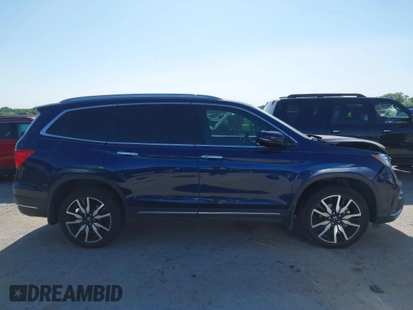 2020 Honda Pilot Elite with VIN 5FNYF6H02LB054348, listed as a IAAI auction lot 42302525 with 43,916 mi miles and . Bid and sale history available at DreamBid. Image 13.
