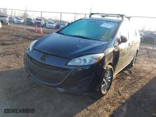 2015 Mazda Mazda5 Sport with VIN JM1CW2BL9F0191005, listed as a IAAI auction lot 41772132 with 218,071 mi miles. Bid and sale history available at carsss.com. Image 2.