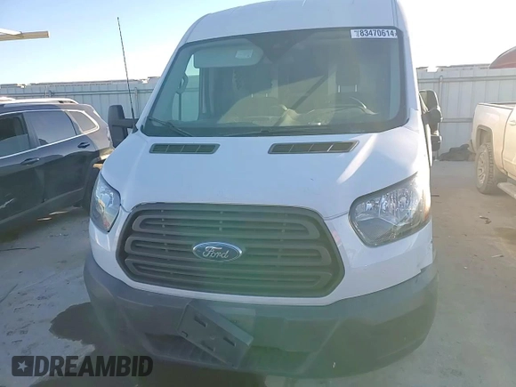 2015 Ford Transit Cargo with VIN 1FTNR2CM1FKA04643, listed as a Copart auction lot 83470614 with 260,133 mi miles and Salvage title. Bid and sale history available at DreamBid. Image 12.