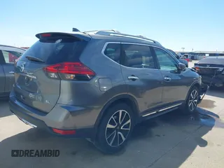 2017 Nissan Rogue SL z VIN 5N1AT2MT8HC749372, wystawiony jako IAAI lot #41622839 z przebiegiem 90 638 mil mil oraz . Historia ofert i sprzedaży dostępna na DreamBid. Obrazek 14.