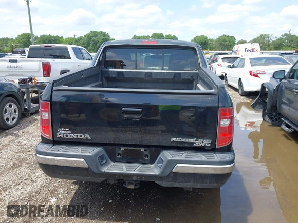 2011 Honda Ridgeline RTL with VIN 5FPYK1F54BB011472, listed as a IAAI auction lot 42112512 with 194,974 mi miles and . Bid and sale history available at DreamBid. Image 16.