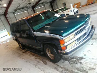 1999 Chevrolet Tahoe with VIN 1GNEC13R9XJ536325, listed as a IAAI auction lot 41475643 with 206,804 mi miles. Bid and sale history available at carsss.com. Image 1.