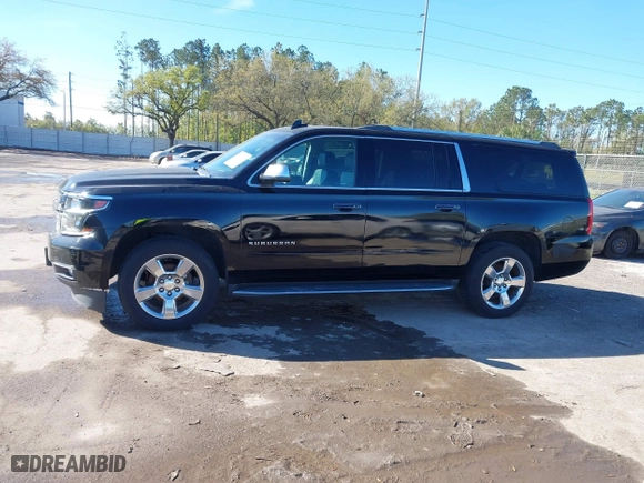 2017 Chevrolet Suburban Premier with VIN 1GNSKJKC0HR114398, listed as a IAAI auction lot 41745611 with 211,906 mi miles. Bid and sale history available at carsss.com. Image 14.