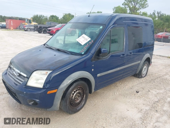 2011 Ford Transit Connect XLT with VIN NM0KS9BN2BT070324, listed as a IAAI auction lot 42511234 with 297,422 mi miles and . Bid and sale history available at DreamBid. Image 2.