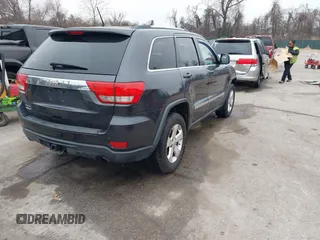 2013 Jeep Grand Cherokee Laredo with VIN 1C4RJFAG9DC506238, listed as a IAAI auction lot 41800981 with 172,676 mi miles. Bid and sale history available at carsss.com. Image 4.