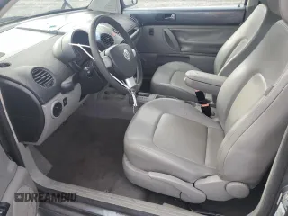 2006 Volkswagen New Beetle Coupe with VIN 3VWRW31C06M403608, listed as a Copart auction lot 82308844 with 125,255 mi miles and Salvage Title. Bid and sale history available at carsss.com. Image 7.