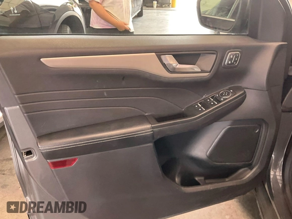 2021 Ford Escape SEL Hybrid z VIN 1FMCU9CZ7MUA83422, wystawiony jako IAAI lot #42743365 z przebiegiem 70 851 mil mil oraz . Historia ofert i sprzedaży dostępna na DreamBid. Obrazek 17.