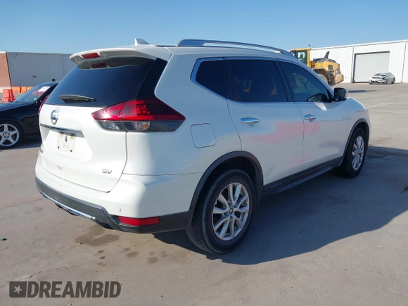 2019 Nissan Rogue SV with VIN KNMAT2MTXKP554619, listed as a IAAI auction lot 41975101 with 86,051 mi miles and . Bid and sale history available at DreamBid. Image 4.