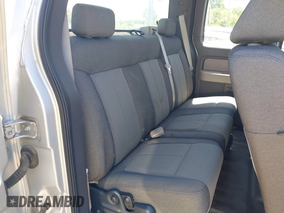 2009 Ford F-150 STX with VIN 1FTRX12W29FA64321, listed as a IAAI auction lot 42653001 with 158,428 mi miles and . Bid and sale history available at DreamBid. Image 8.