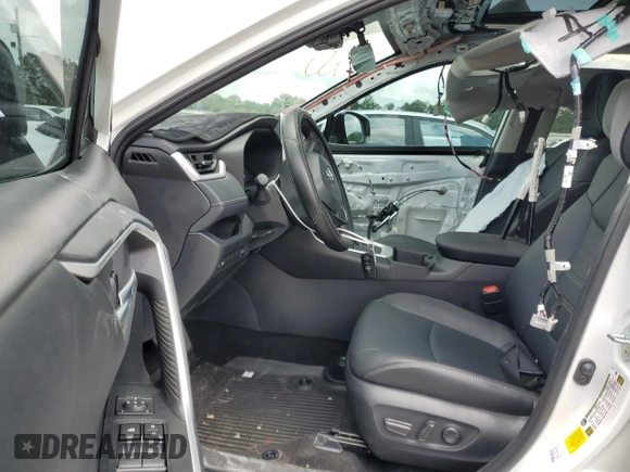 2024 Toyota RAV4 XLE Premium with VIN 2T3C1RFV5RW349729, listed as a Copart auction lot 59033195 with 10,524 mi miles and Salvage title. Bid and sale history available at DreamBid. Image 7.
