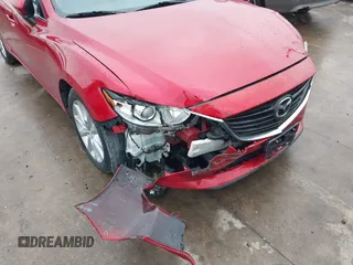 2016 Mazda 6 i Sport with VIN JM1GJ1U59G1442268, listed as a IAAI auction lot 42193461 with 151,207 mi miles and . Bid and sale history available at DreamBid. Image 6.