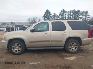 2009 GMC Yukon SLT w/4SA with VIN 1GKEC33379R300278, listed as a IAAI auction lot 41617937 with 240,623 mi miles. Bid and sale history available at carsss.com. Image 14.