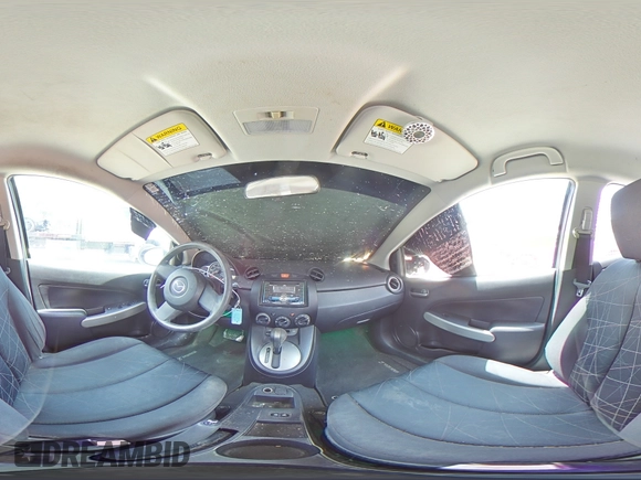 2012 Mazda 2 Sport with VIN JM1DE1KZ5C0141784, listed as a Copart auction lot 56498295 with 132,602 mi miles and Salvage Title. Bid and sale history available at DreamBid. Image 14.