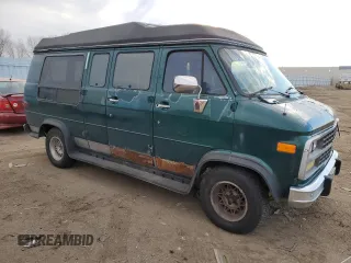1995 Chevrolet Chevy Van z VIN 1GBEG25K8SF209126, wystawiony jako Copart lot #86254464 z przebiegiem 161 683 mil mil oraz Czysty tytuł • Clean title. Historia ofert i sprzedaży dostępna na DreamBid. Obrazek 4.