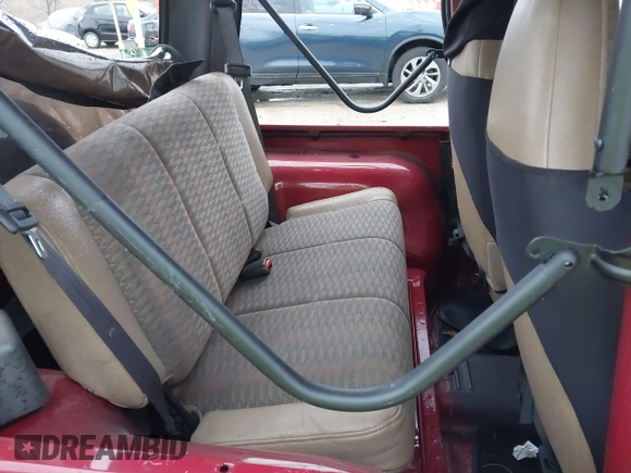 1999 Jeep Wrangler SE with VIN 1J4FY29P6XP408738, listed as a IAAI auction lot 41716999 with 124,692 mi miles. Bid and sale history available at carsss.com. Image 8.