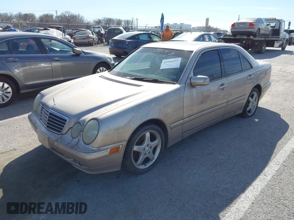 2001 Mercedes-Benz E-Class with VIN WDBJF65J61B251908, listed as a IAAI auction lot 41800893 with 187,178 mi miles. Bid and sale history available at carsss.com. Image 2.