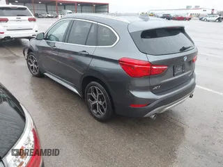 2019 BMW X1 sDrive28i with VIN WBXHU7C52K5L12160, listed as a IAAI auction lot 41452244 with 59,344 mi miles and . Bid and sale history available at DreamBid. Image 3.