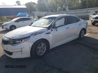 2016 Kia Optima LX z VIN KNAGT4L36G5070051, wystawiony jako Copart lot #56347385 z przebiegiem 105 039 mil mil oraz Szkoda całkowita • Salvage title. Historia ofert i sprzedaży dostępna na DreamBid. Obrazek 1.