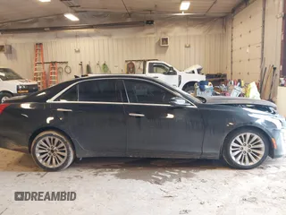 2014 Cadillac CTS Luxury AWD with VIN 1G6AX5SX2E0195357, listed as a IAAI auction lot 41677831 with 152,567 mi miles and . Bid and sale history available at DreamBid. Image 13.