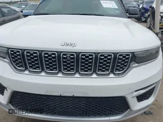 2022 Jeep Grand Cherokee Summit z VIN 1C4RJGEG3N8636665, wystawiony jako IAAI lot #41957924 z przebiegiem Nie podano mil oraz . Historia ofert i sprzedaży dostępna na DreamBid. Obrazek 1.